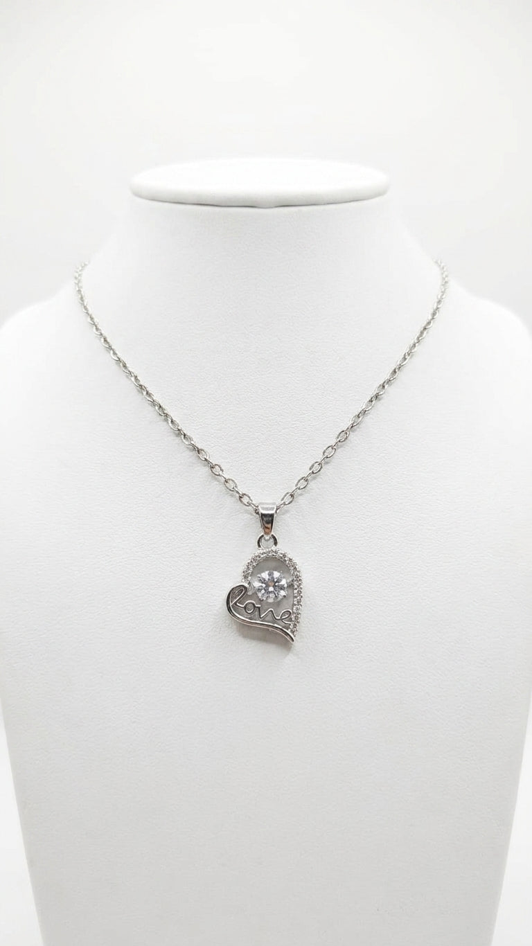 CZ love heart pendant necklace silver-tone on marble surface with pink velvet jewelry box and white orchids – AureliaBlends bridal gift