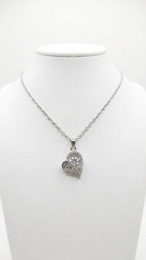 CZ love heart pendant necklace silver-tone on marble surface with pink velvet jewelry box and white orchids – AureliaBlends bridal gift