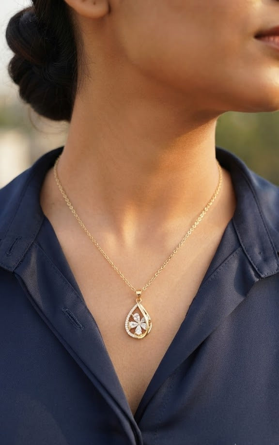 Gold CZ clover teardrop pendant necklace in navy blue velvet gift box – AureliaBlends