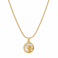 Woman wearing gold cherub angel medallion pendant necklace with mother-of-pearl inlay on snake chain at collarbone in white blouse – AureliaBlends bridal jewelry