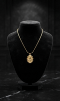 Gold tulip medallion pendant necklace on cream velvet jewelry bust with pink roses and teal velvet jewellery boxes – formal occasion necklace UAE Australia AureliaBlends