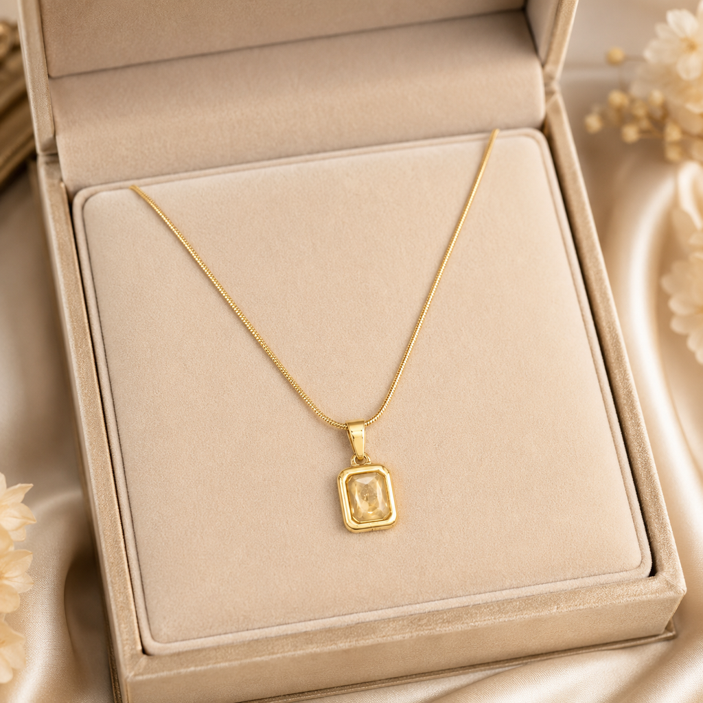 Gold champagne crystal rectangle pendant necklace in open beige luxury gift box with satin bow and 'A Gift For You' card on cream satin – bridal jewelry gift AureliaBlends