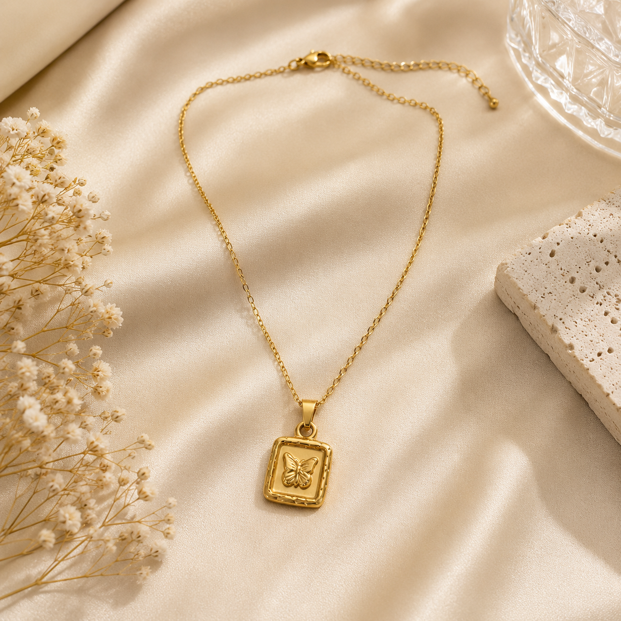 Gold butterfly medallion necklace in cream jewellery box with dried flowers – elegant gift necklace by AureliaBlends