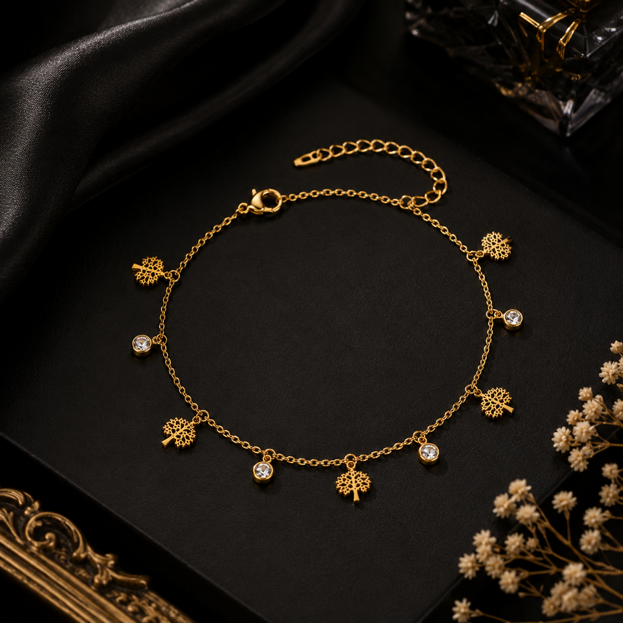 Gold Tree of Life CZ charm bracelet flat lay on iridescent pastel surface with pink flowers and crystal – dainty gold bracelet gift AureliaBlends