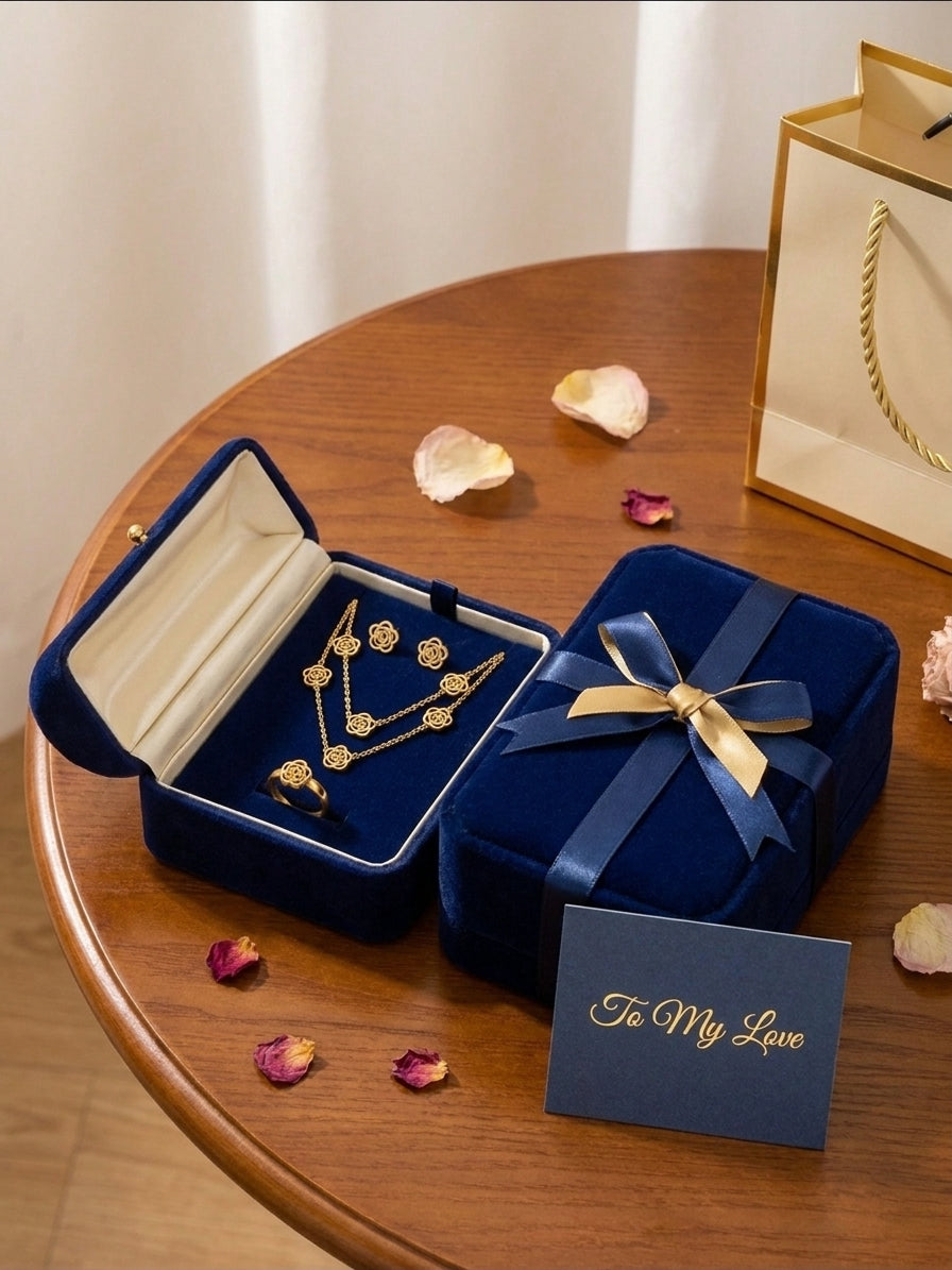 Gold filigree rose jewellery set in open emerald green velvet gift box with green satin ribbon and To My Love card surrounded by pink roses – anniversary gift set AureliaBlends
