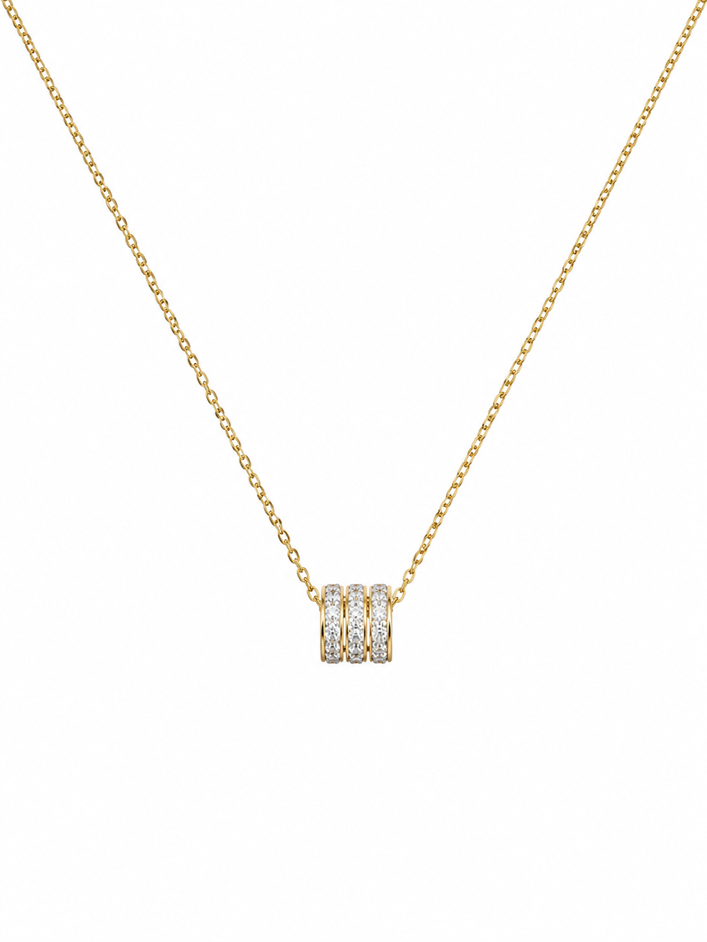 Gold triple pavé CZ crystal ring bead barrel pendant necklace close-up on black velvet – dainty 18K gold-plated diamond-look necklace by AureliaBlends