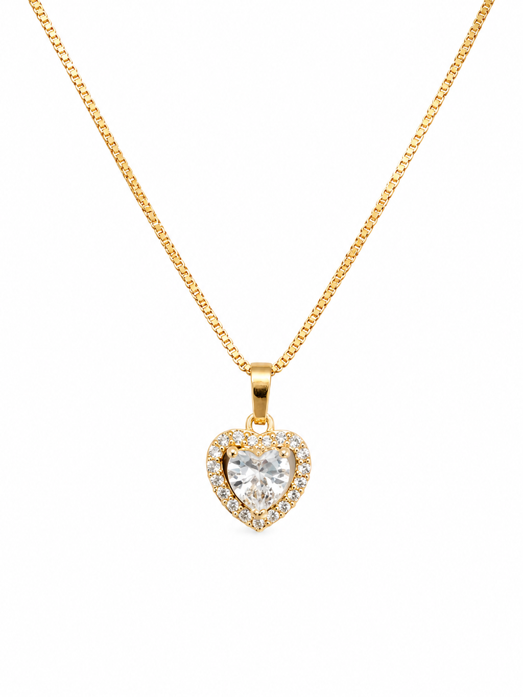 Gold heart halo CZ diamond solitaire pendant necklace worn on model with white V-neck top showing pendant at collarbone – 18K gold-plated pavé heart necklace by AureliaBlends