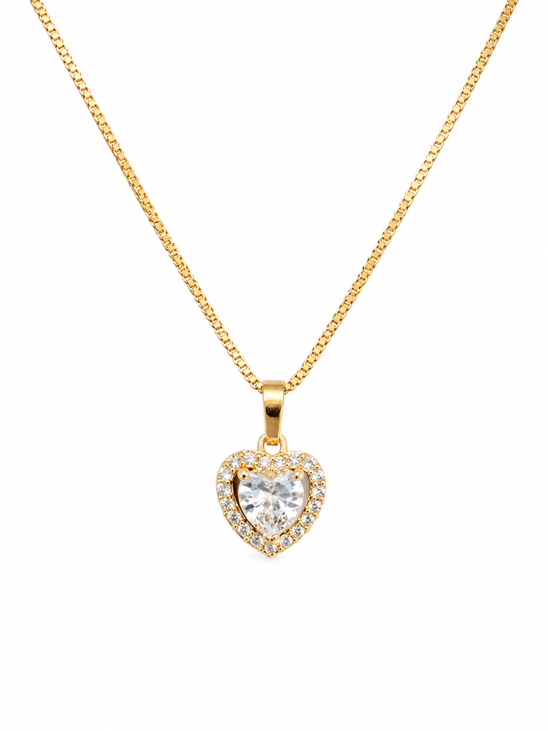 Gold heart halo CZ diamond solitaire pendant necklace worn on model with white V-neck top showing pendant at collarbone – 18K gold-plated pavé heart necklace by AureliaBlends