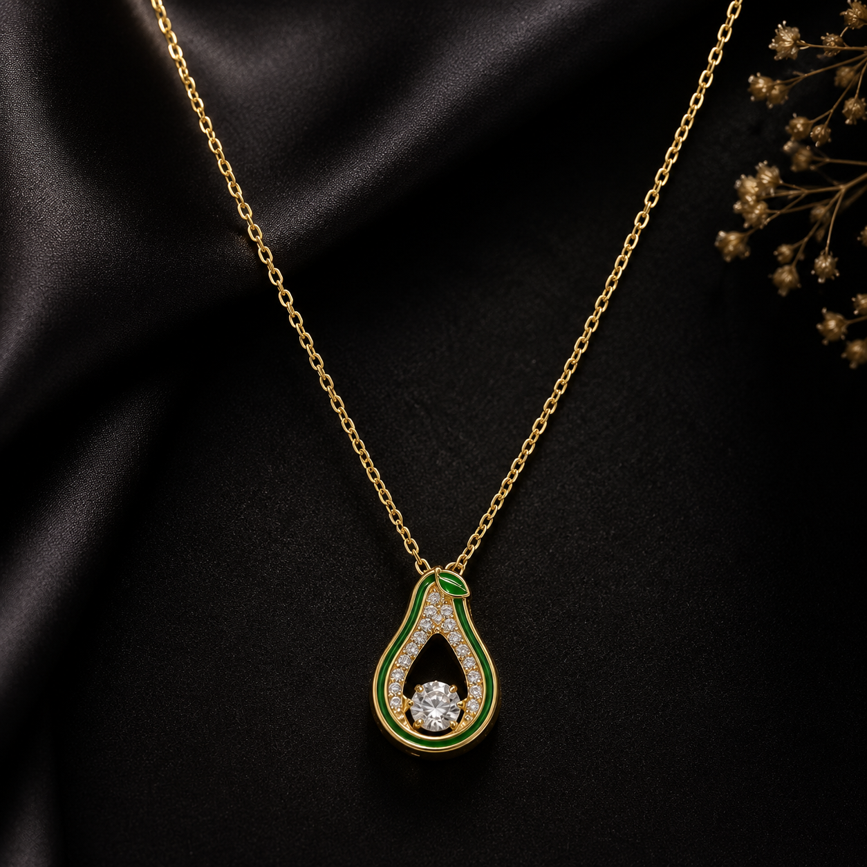 Gold green enamel teardrop CZ pendant necklace on cream satin surrounded by blush pink roses, rose petals and baby's breath – AureliaBlends romantic gift for her bridal jewelry