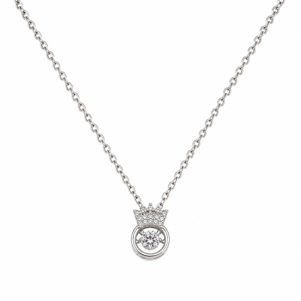 Silver CZ crown orbital pendant necklace on cream satin flat lay with dried baby's breath and crystal perfume bottle – AureliaBlends Royal Orbit Collection lifestyle shot