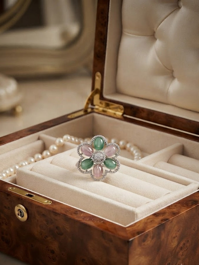 Yellow cat-eye stone floral cocktail ring in rose gold CZ scalloped setting displayed in open navy blue velvet luxury ring box with A Gift for You card on dark wooden table with white rose petals and cream ribbon – AureliaBlends