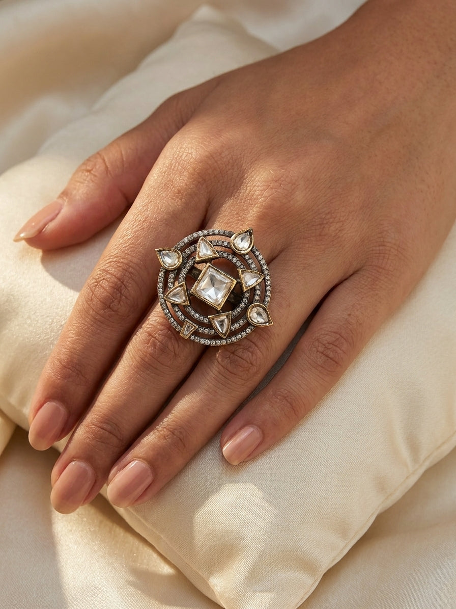 Gold antique polki cocktail ring with square polki centre stone and triangular pear polki compass star design and double pave CZ border product shot on black velvet background showing full circular open-work frame – AureliaBlends