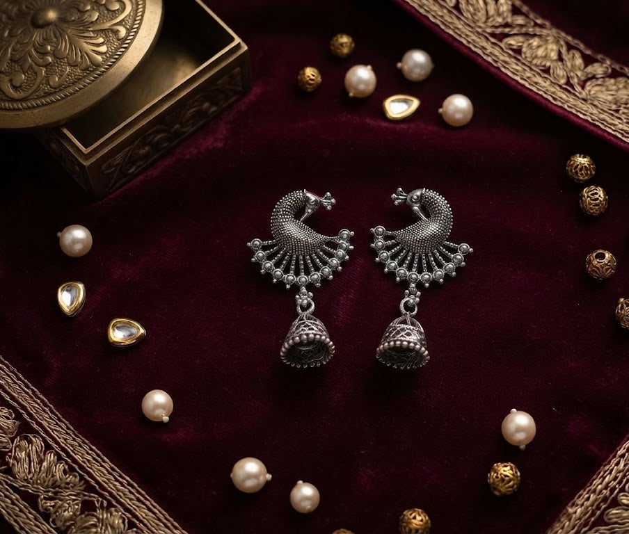 Three pairs of oxidized silver peacock jhumka earrings with bell drop – Indian ethnic statement earrings