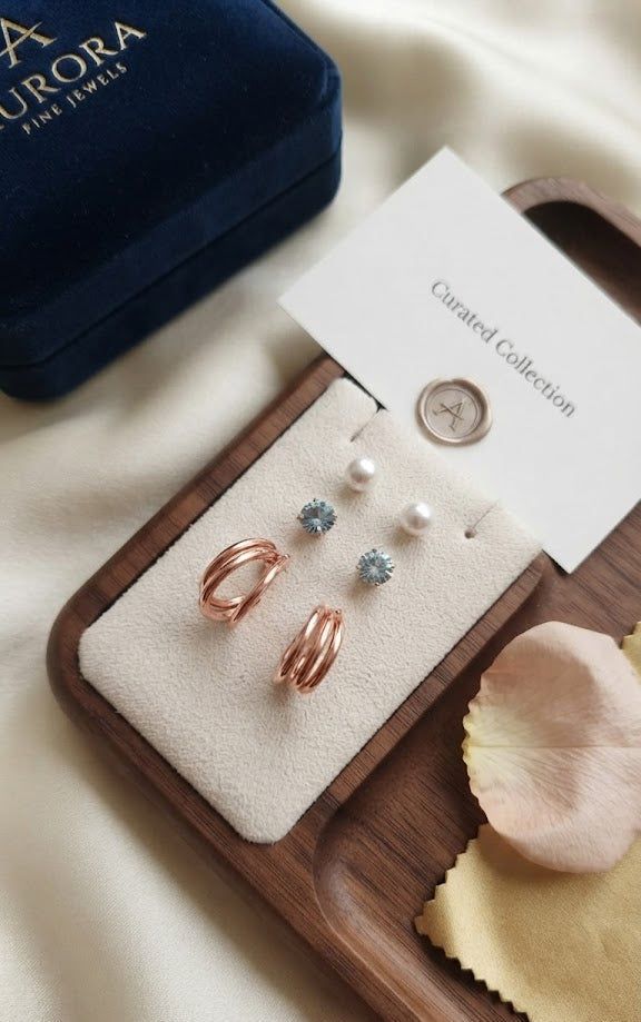 Front and back view of gold-plated triple hoop drop earrings with pearl and crystal stud tops – AureliaBlends
