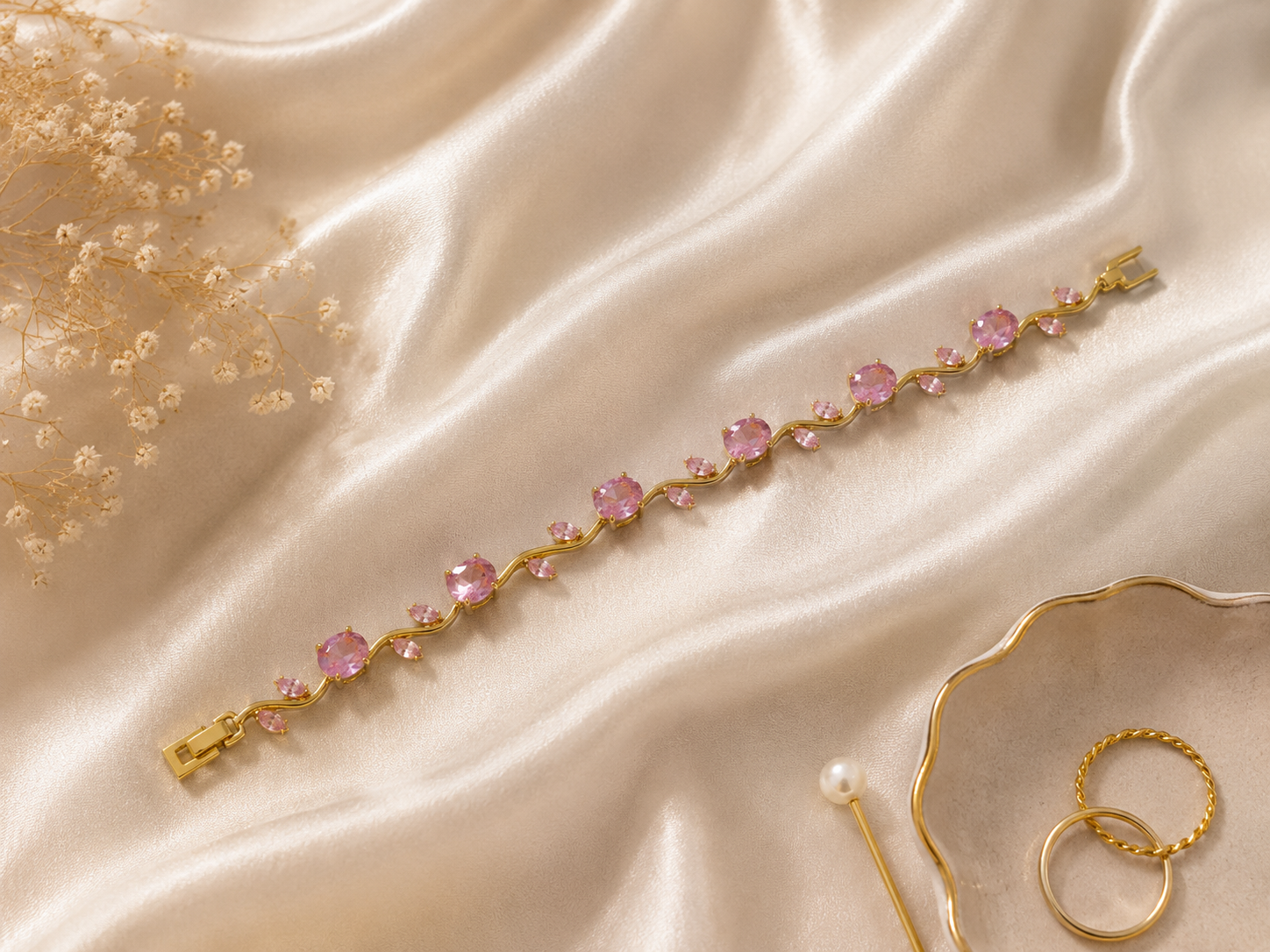 Rose pink CZ floral vine bracelet displayed in premium taupe velvet-lined gift box on cream silk – AureliaBlends