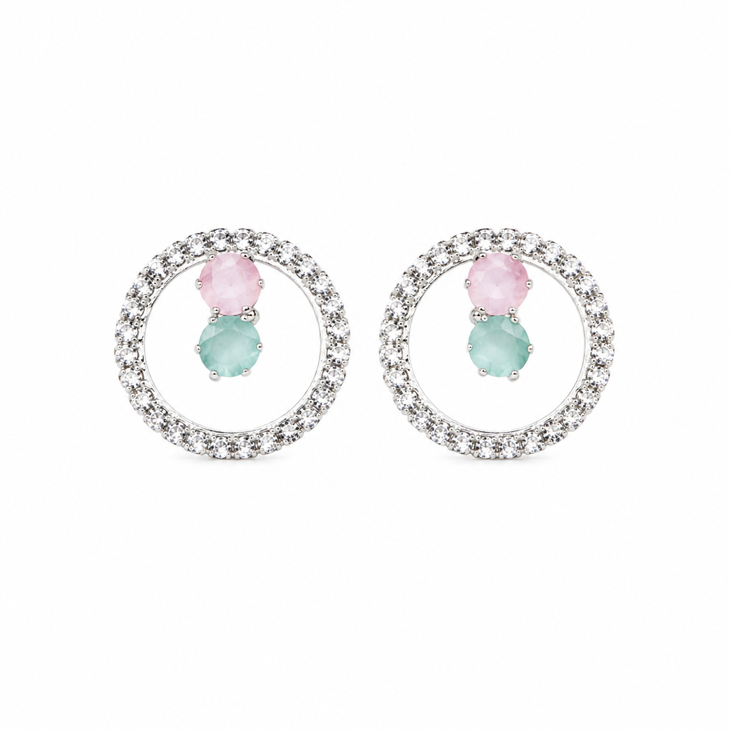 Silver-tone open circle CZ stud earrings with pink and mint teal crystal centre stones on white background – AureliaBlends
