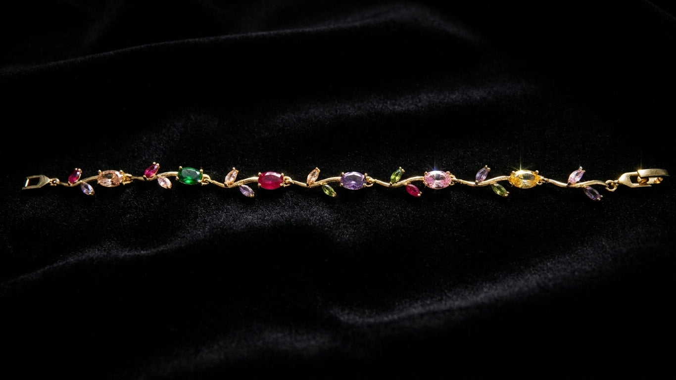 Multicolour CZ oval and marquise floral vine bracelet on black velvet background showing full rainbow gemstone design – AureliaBlends