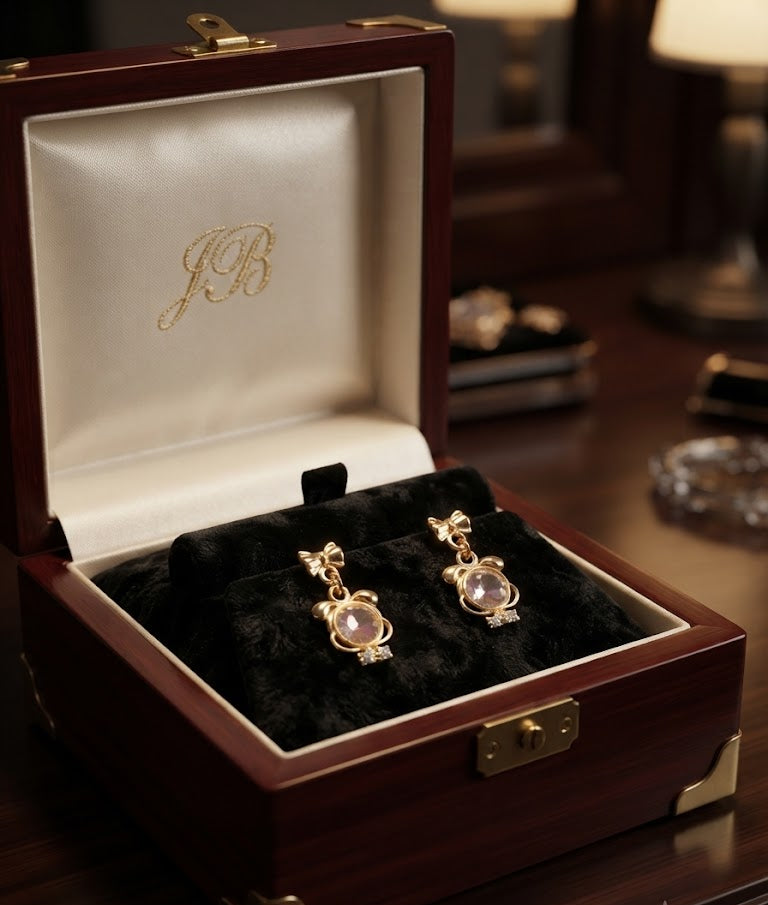 Gold bow crystal drop earrings in cream velvet box surrounded by dusty pink roses and hydrangeas with 'For You With Love' gift card – AureliaBlends romantic bridal earrings