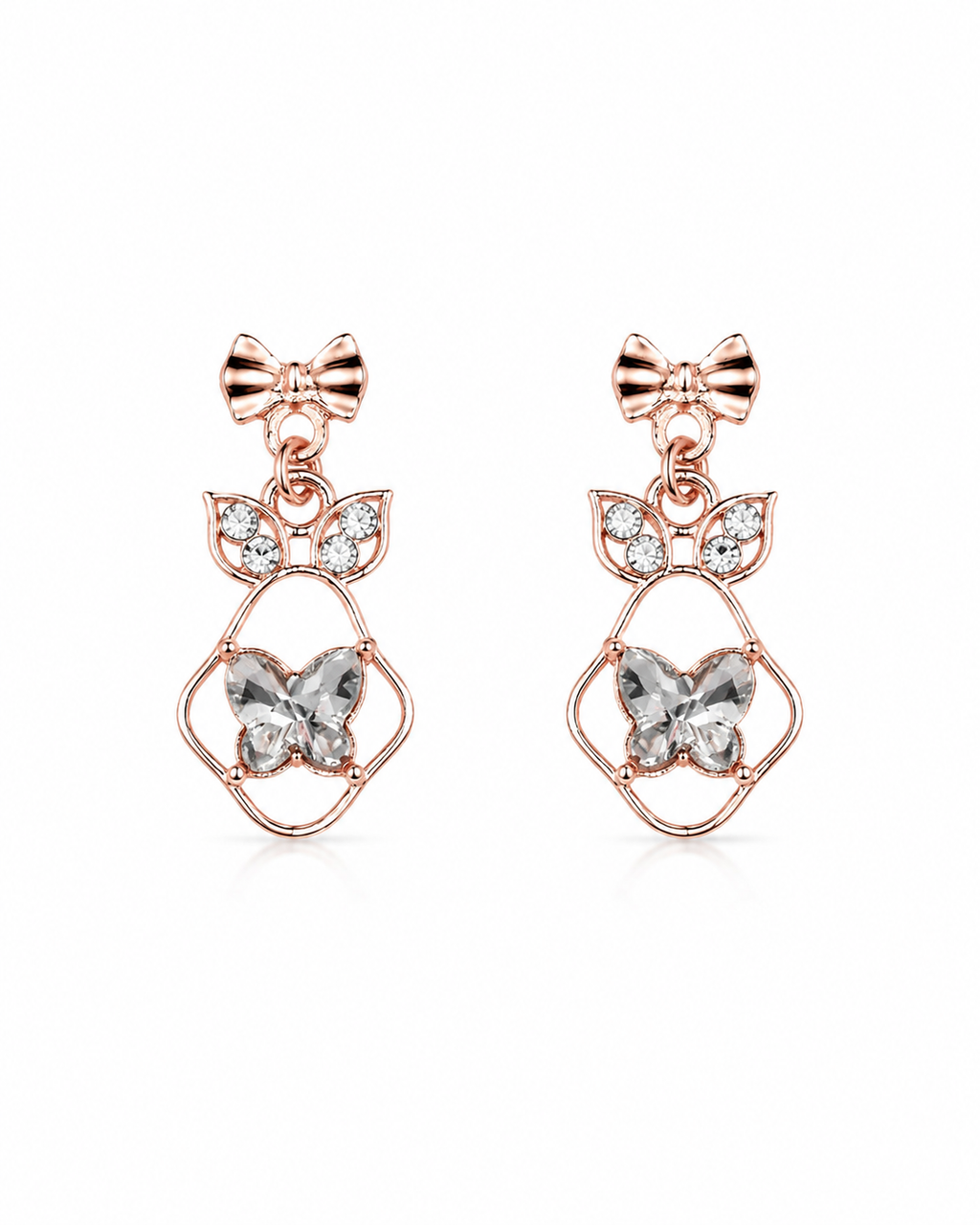 Model wearing rose gold bow and butterfly crystal drop earrings with CZ leaf connector – AureliaBlends bridal dangle earrings