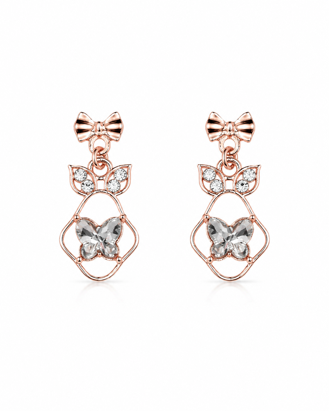 Model wearing rose gold bow and butterfly crystal drop earrings with CZ leaf connector – AureliaBlends bridal dangle earrings