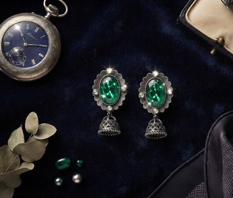 Oxidized silver oval gemstone jhumka earrings in aqua blue, yellow and black – three color variants on navy fashion display card AureliaBlends