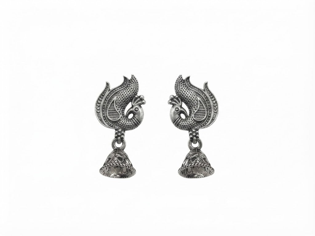 Model wearing oxidized silver phoenix bird jhumka earrings with blue silk kurta – Indian ethnic statement dangle earrings by AureliaBlends