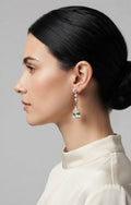 Model with sleek low bun wearing gold CZ stud pearl chain and teardrop crystal drop earrings – AureliaBlends bridal jewellery