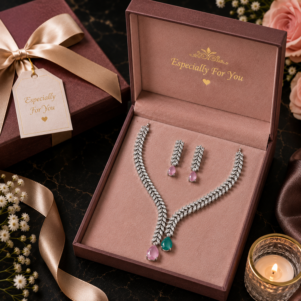 Silver marquise CZ wheat chain necklace and pink teardrop earring set on black background with baby's breath – AureliaBlends luxury bridal jewelry