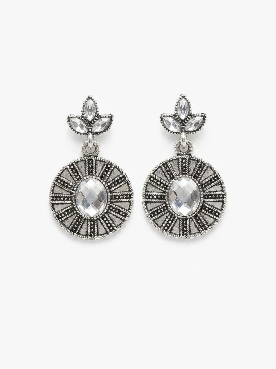 Model wearing oxidised silver marquise leaf trefoil stud and engraved geometric disc drop earrings with clear crystal stones – AureliaBlends ethnic dangle earrings