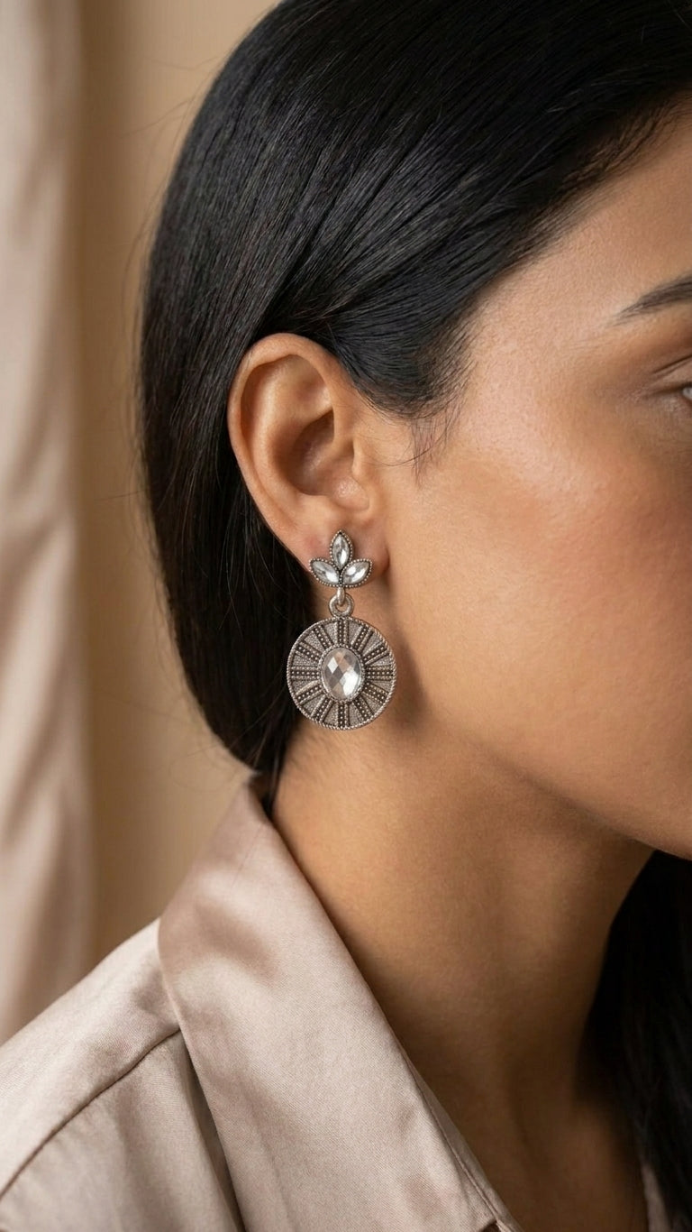 Oxidised silver marquise leaf and engraved disc drop earrings with amethyst purple gemstone stones on dark slate stone with lavender sprigs and cream satin – AureliaBlends statement earrings