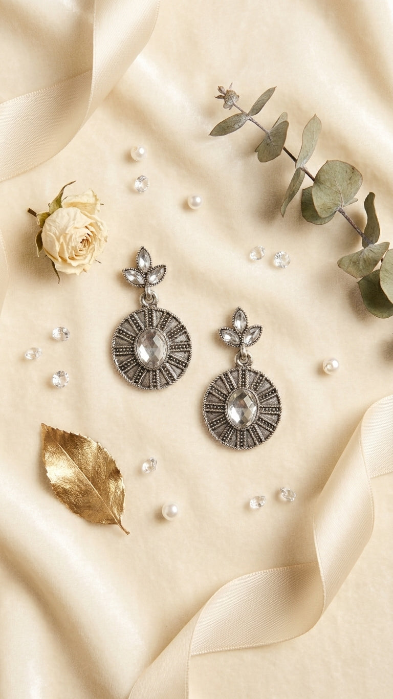 Oxidised silver marquise leaf and engraved disc drop earrings with turquoise blue gemstone stones on linen with dried white flowers, seashells and cream ribbon – AureliaBlends boho earrings