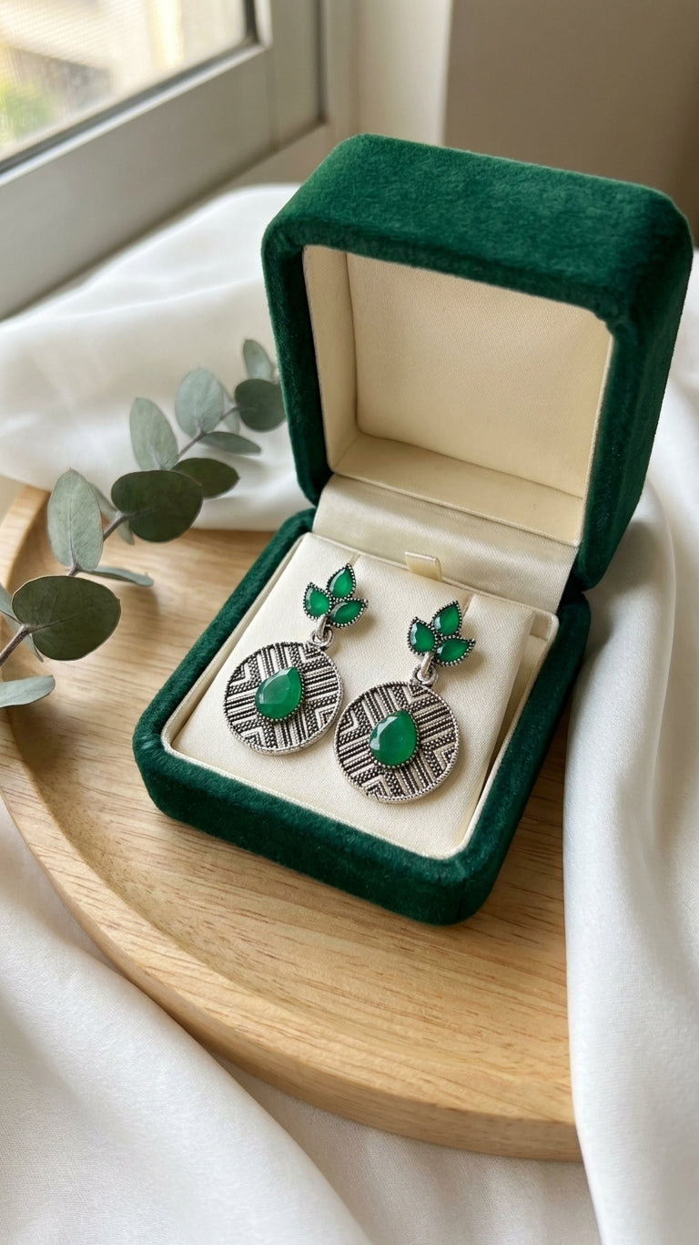 Oxidised silver marquise leaf and engraved disc drop earrings four colourways flat lay – clear crystal, emerald green, amethyst purple, turquoise blue – AureliaBlends gemstone earrings