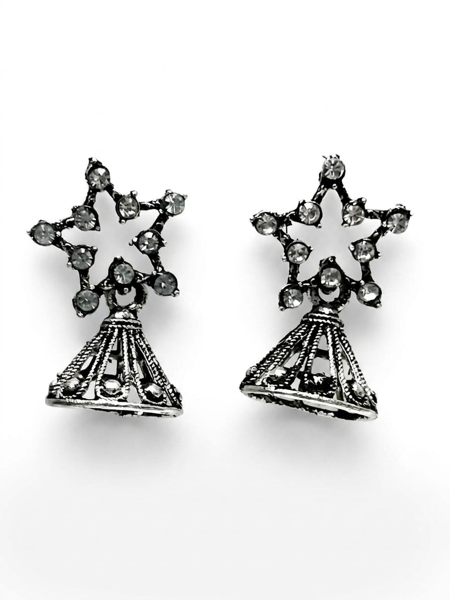 Oxidised silver CZ star pavé and conical filigree jhumka bell drop earrings in open dark burl walnut jewellery box with cream satin lining on wooden surface – AureliaBlends ethnic earrings