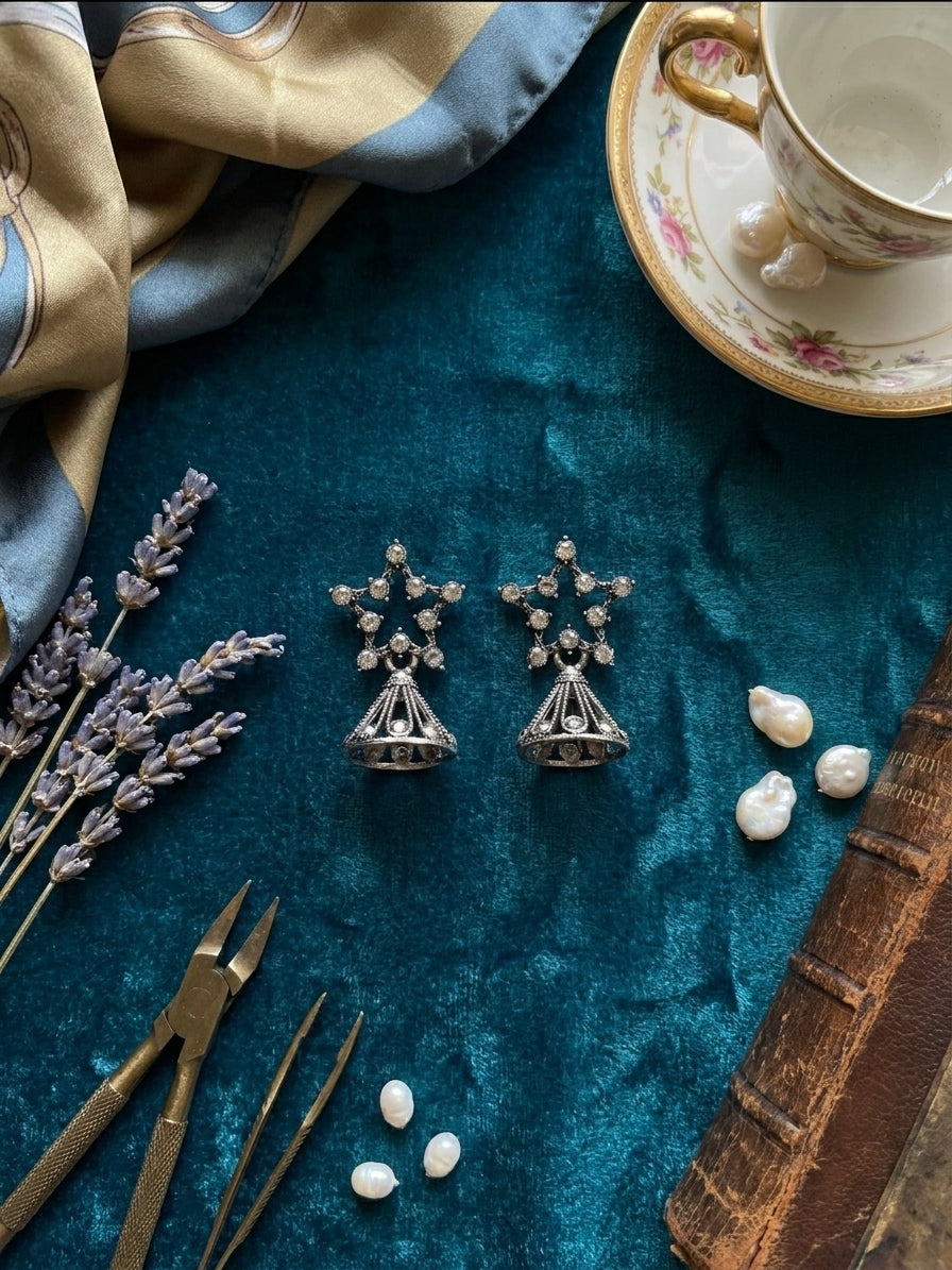 Oxidised silver CZ star and filigree jhumka bell drop earrings in open dark burl walnut jewellery box with cream satin lining and gold For You gift card on teal velvet with lavender and baroque pearls – AureliaBlends luxury gift earrings