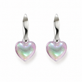 Model with elegant updo wearing silver twisted huggie hoop and puffy iridescent aurora heart crystal drop earrings showing blush pink mint green lavender shimmer against white background – AureliaBlends romantic earrings