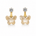 All 5 colourways of gold-plated CZ stud and faceted butterfly crystal drop earrings displayed in beige velvet multi-compartment jewellery tray – champagne golden shadow, emerald green, periwinkle blue, smoky grey, magenta olivine – AureliaBlends