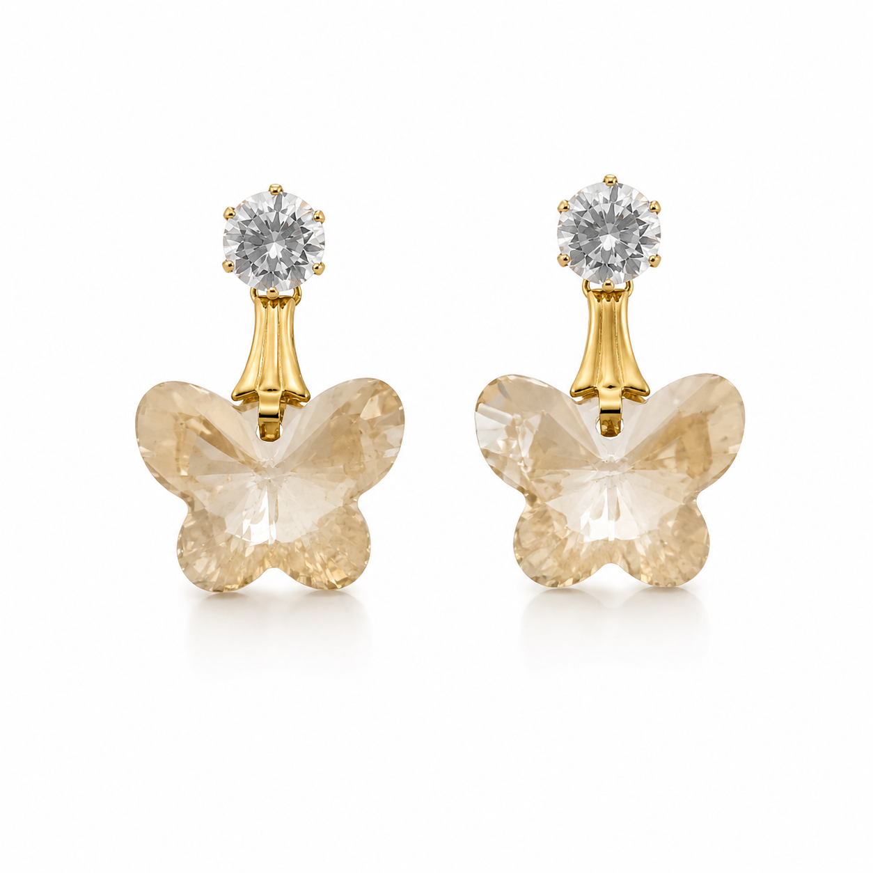 All 5 colourways of gold-plated CZ stud and faceted butterfly crystal drop earrings displayed in beige velvet multi-compartment jewellery tray – champagne golden shadow, emerald green, periwinkle blue, smoky grey, magenta olivine – AureliaBlends