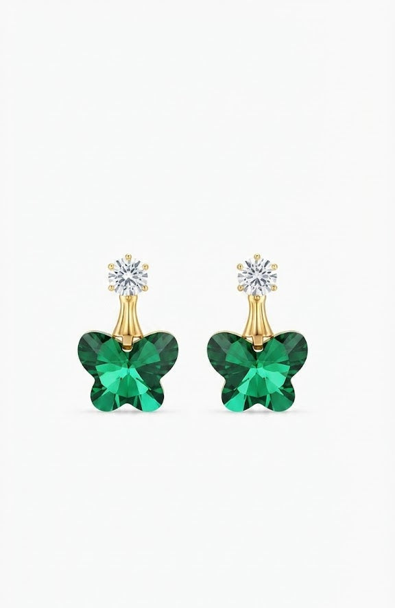 Close-up of gold-plated 6-prong crown CZ solitaire stud and gold tapered bail with faceted emerald green butterfly crystal pendant showing deeply cut light-refracting wings – AureliaBlends butterfly drop earrings detail
