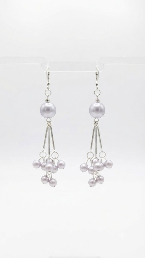 Silver lavender grey pearl cluster chandelier drop earrings on a cream velvet jewellery tray on dark burl wood surface with a cream drawstring pouch, loose pearls, pearl necklace, compact mirror, satin ribbon and Perle de Chandelier tag – AureliaBlends