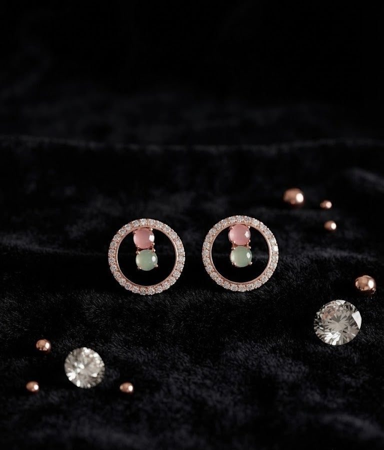 Rose gold pavé CZ open circle halo pink and mint stone stud earrings close-up on dark background showing full pavé CZ open circle frame, blush pink rose quartz top stone and mint green aventurine bottom stone detail – AureliaBlends