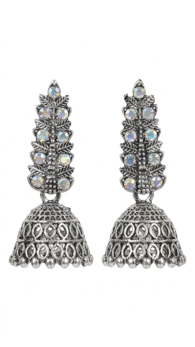 Oxidised silver jhumka earrings with AB crystal leaf drop on pink floral background – AureliaBlends bridal earrings
