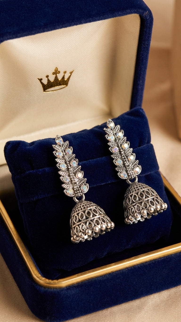 Model wearing oxidised silver jhumki earrings with blue silk saree – statement drop earrings AureliaBlends