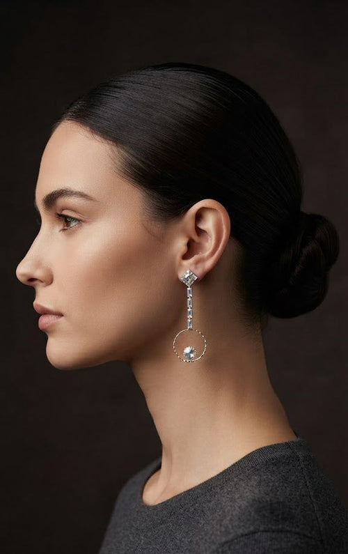 Crystal hoop drop earrings flatlay on marble with watch and journal – AureliaBlends bridal earrings