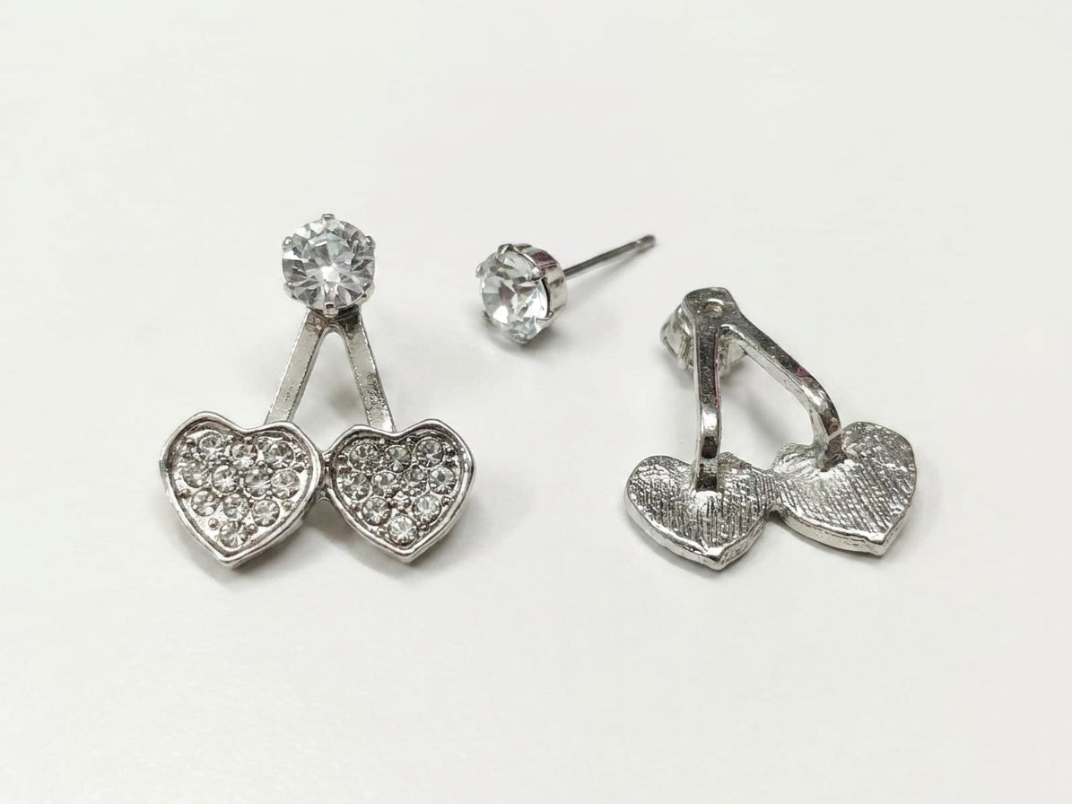 Silver cubic zirconia double heart ear jacket earrings on white background – AureliaBlends Diamond Heart Collection